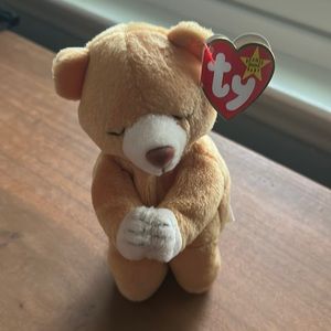 Ty beanie baby. “Hope” praying bear. Great condition. Tag still attached.